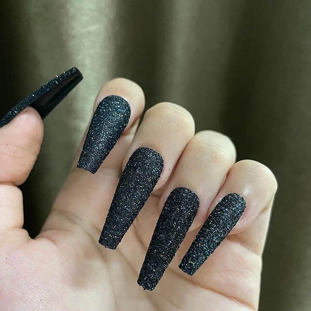 black nails with glitter